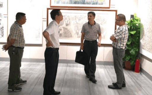 广东省考试院孔智军副院长(左二) 原佛山市教育局商学兵局长(右二)来校调研